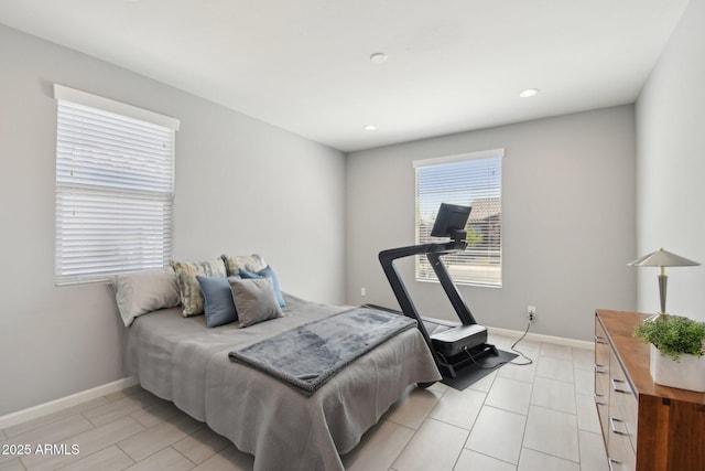 bedroom featuring recessed lighting and baseboards