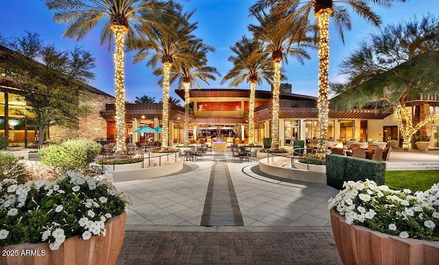 view of patio terrace at dusk