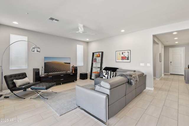 living room with visible vents, recessed lighting, baseboards, and ceiling fan