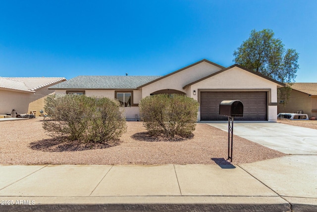 1727 W 12th Ave, Apache Junction, AZ 85120 - ranch-style house featuring stucco siding, a garage, and driveway