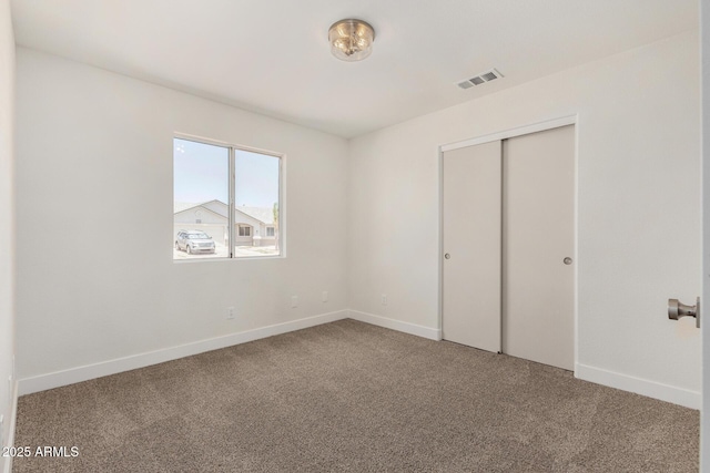 1727 W 12th Ave, Apache Junction, AZ 85120 - unfurnished bedroom featuring carpet flooring and a closet
