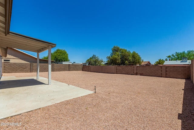 1727 W 12th Ave, Apache Junction, AZ 85120 - fenced backyard featuring a patio