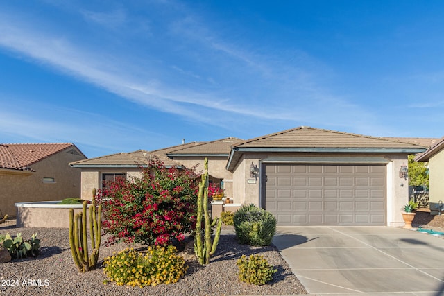 view of front of property featuring a garage