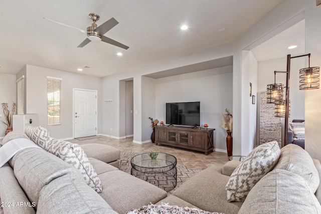 living room featuring ceiling fan