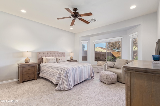 carpeted bedroom featuring ceiling fan