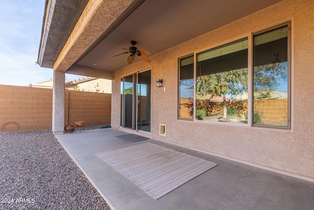 view of patio featuring ceiling fan