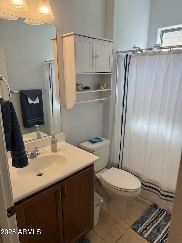 full bath with tile patterned floors, toilet, vanity, and a shower with curtain