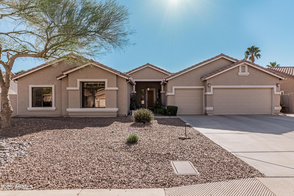 single story home with a garage