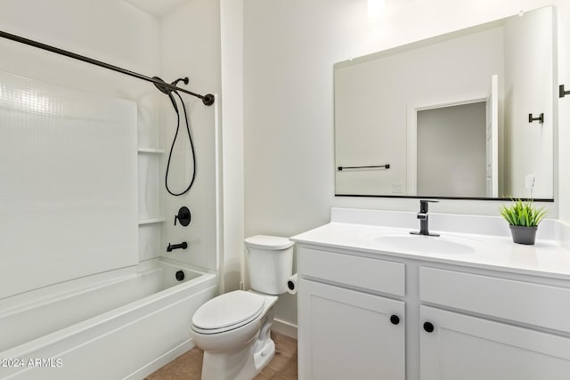 full bathroom with vanity, wood-type flooring,  shower combination, and toilet