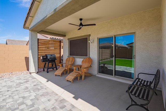 view of patio / terrace with ceiling fan and grilling area