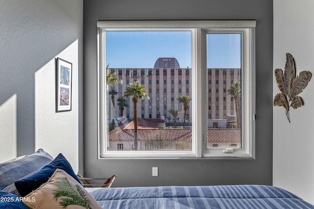 bedroom featuring multiple windows