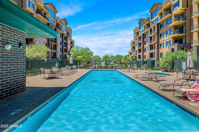 view of pool featuring a patio area