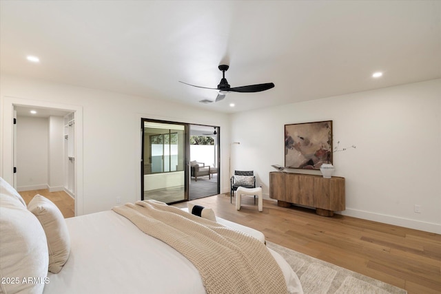 bedroom featuring ceiling fan, recessed lighting, baseboards, light wood-style floors, and access to outside