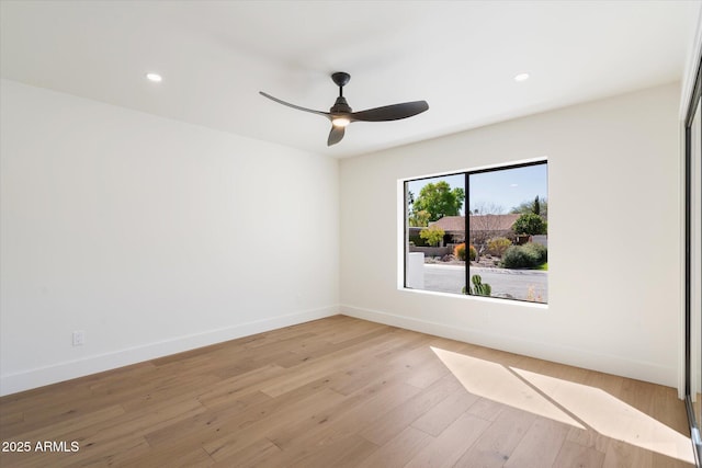 unfurnished room with light wood-style flooring, baseboards, ceiling fan, and recessed lighting