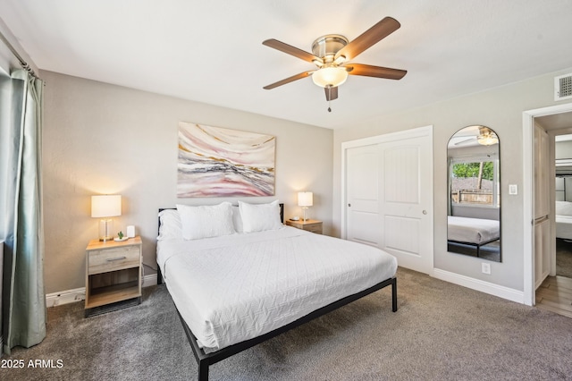 bedroom with a closet, baseboards, a ceiling fan, and carpet flooring