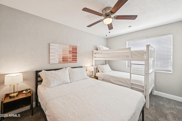 bedroom with carpet floors, baseboards, and ceiling fan