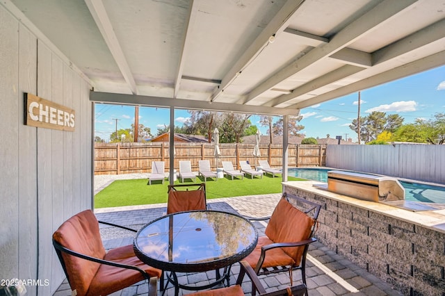 view of patio / terrace featuring a fenced backyard and outdoor dining area