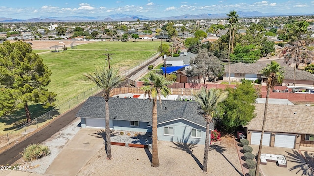 drone / aerial view with a residential view and a mountain view