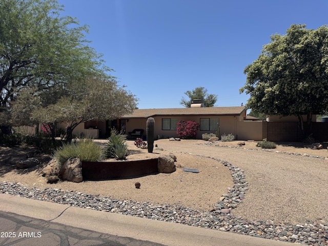 12212 N 66th St, Scottsdale, AZ 85254 - ranch-style home featuring stucco siding and a chimney