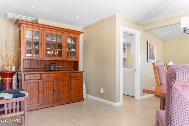 12212 N 66th St, Scottsdale, AZ 85254 - bar featuring baseboards and washer / clothes dryer