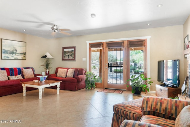 12212 N 66th St, Scottsdale, AZ 85254 - living room featuring a ceiling fan, light tile patterned flooring, and recessed lighting