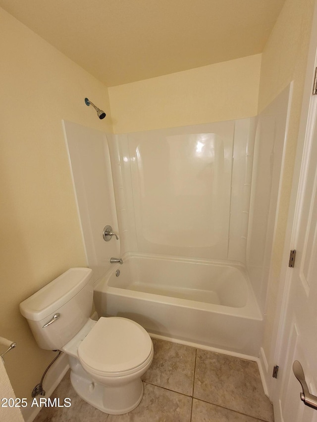 full bath with tile patterned floors, shower / bath combination, and toilet
