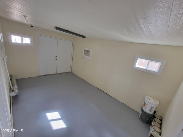 interior space featuring concrete flooring and visible vents