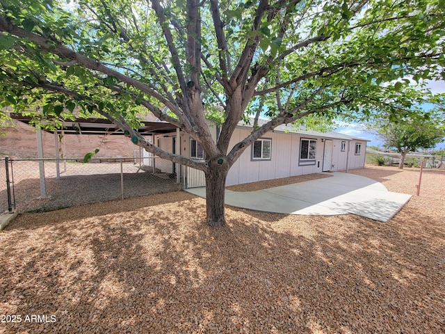 back of house with a patio area and fence private yard