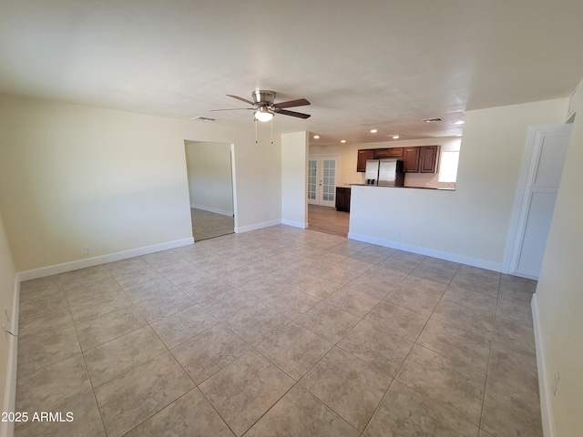 unfurnished living room featuring recessed lighting, visible vents, light tile patterned floors, baseboards, and ceiling fan