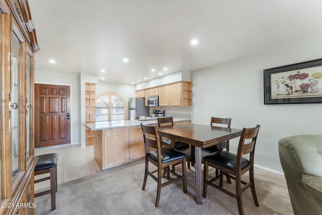 dining room with light tile patterned floors