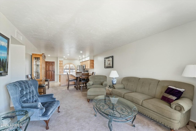 living room with light carpet