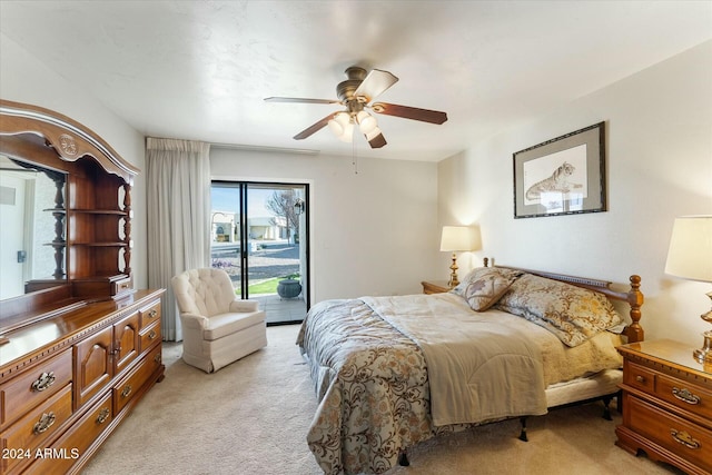 carpeted bedroom featuring ceiling fan and access to exterior