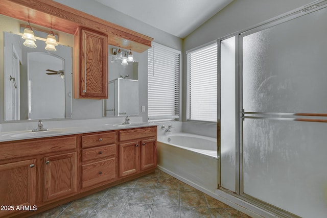 bathroom featuring tile patterned flooring, lofted ceiling, plus walk in shower, ceiling fan, and vanity