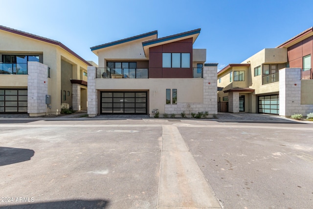 contemporary house featuring a balcony