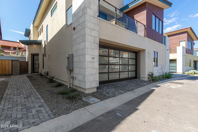 view of property exterior with a balcony