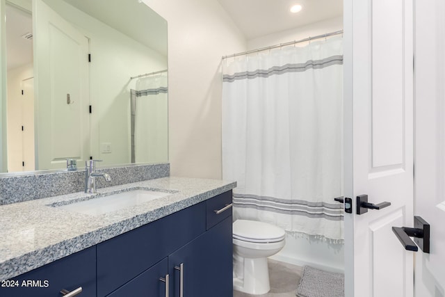 full bathroom featuring shower / bath combo, vanity, toilet, and tile patterned floors