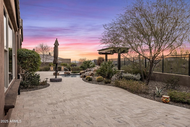 patio terrace at dusk with fence