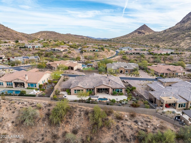 aerial view featuring a mountain view and a residential view