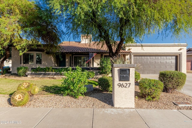 view of front of home featuring a garage