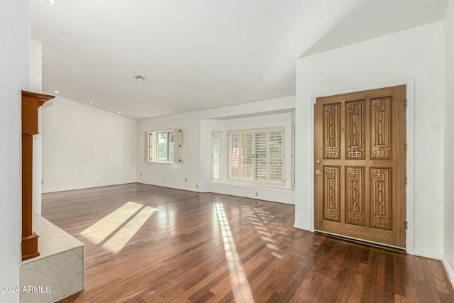 interior space with dark hardwood / wood-style floors