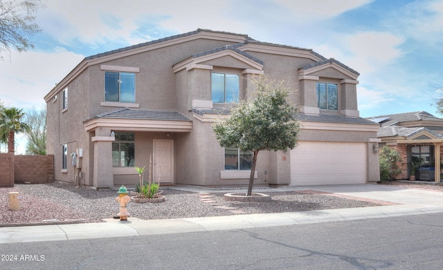 view of property featuring a garage