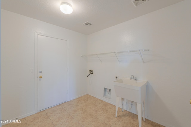 laundry area with washer hookup and hookup for an electric dryer