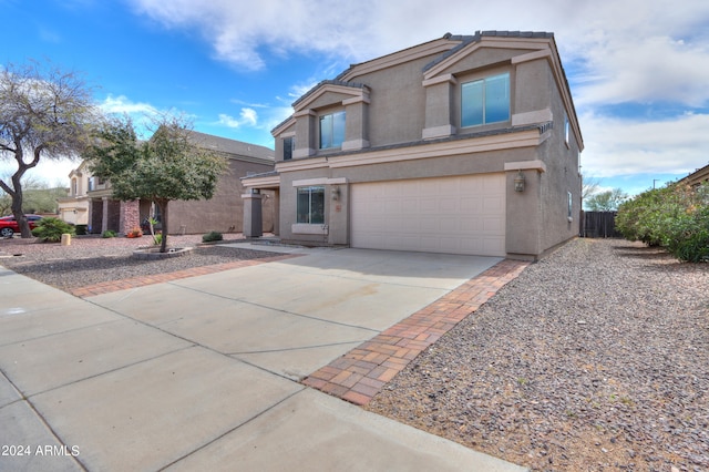 front of property with a garage