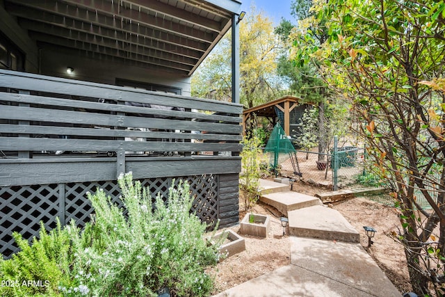 exterior details featuring fence