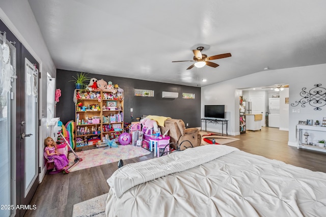 bedroom featuring wood finished floors, baseboards, a ceiling fan, and vaulted ceiling