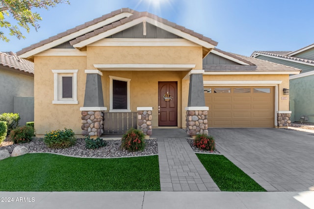 craftsman-style home with a garage