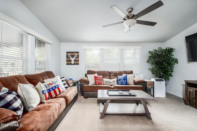 carpeted living room featuring lofted ceiling, plenty of natural light, and ceiling fan