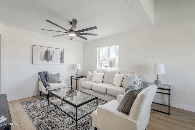 1021 S Almar Cir, Mesa, AZ 85204 - living room featuring ceiling fan, light wood finished floors, and baseboards