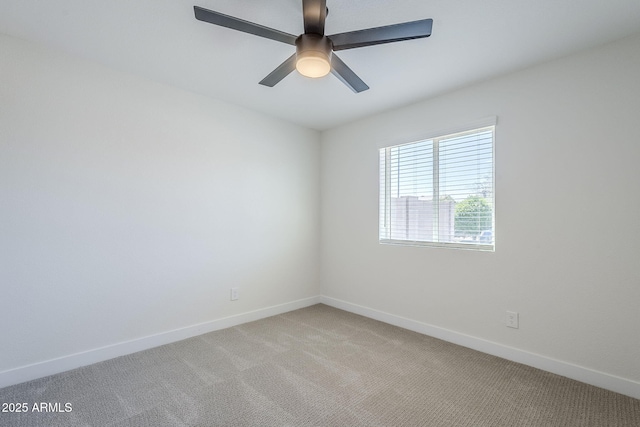 1021 S Almar Cir, Mesa, AZ 85204 - spare room with light carpet, baseboards, and a ceiling fan