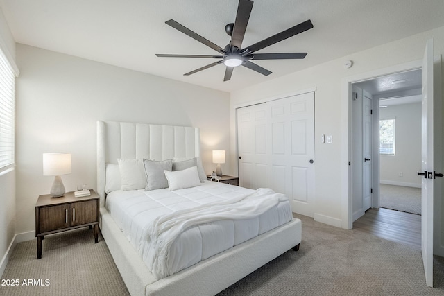 1021 S Almar Cir, Mesa, AZ 85204 - carpeted bedroom with a closet, baseboards, and ceiling fan